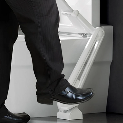 Foot-operated toilet seat lifter